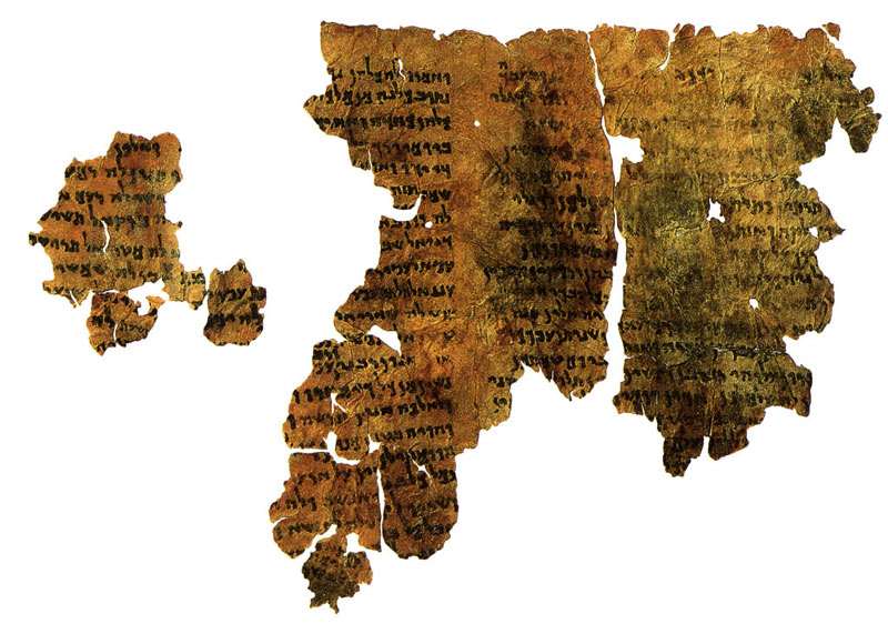 Photograph of fragmented Aramaic Enoch manuscript pieces from Qumran Cave 4